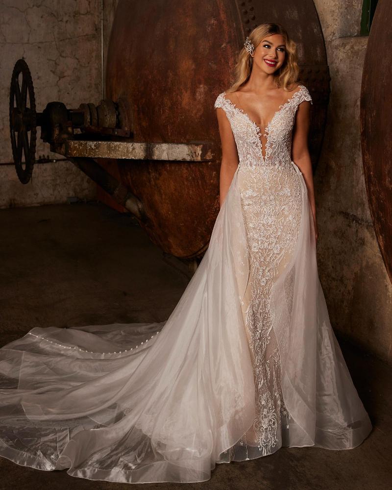 122242 sparkly wedding dress with overskirt and plunging neckline5